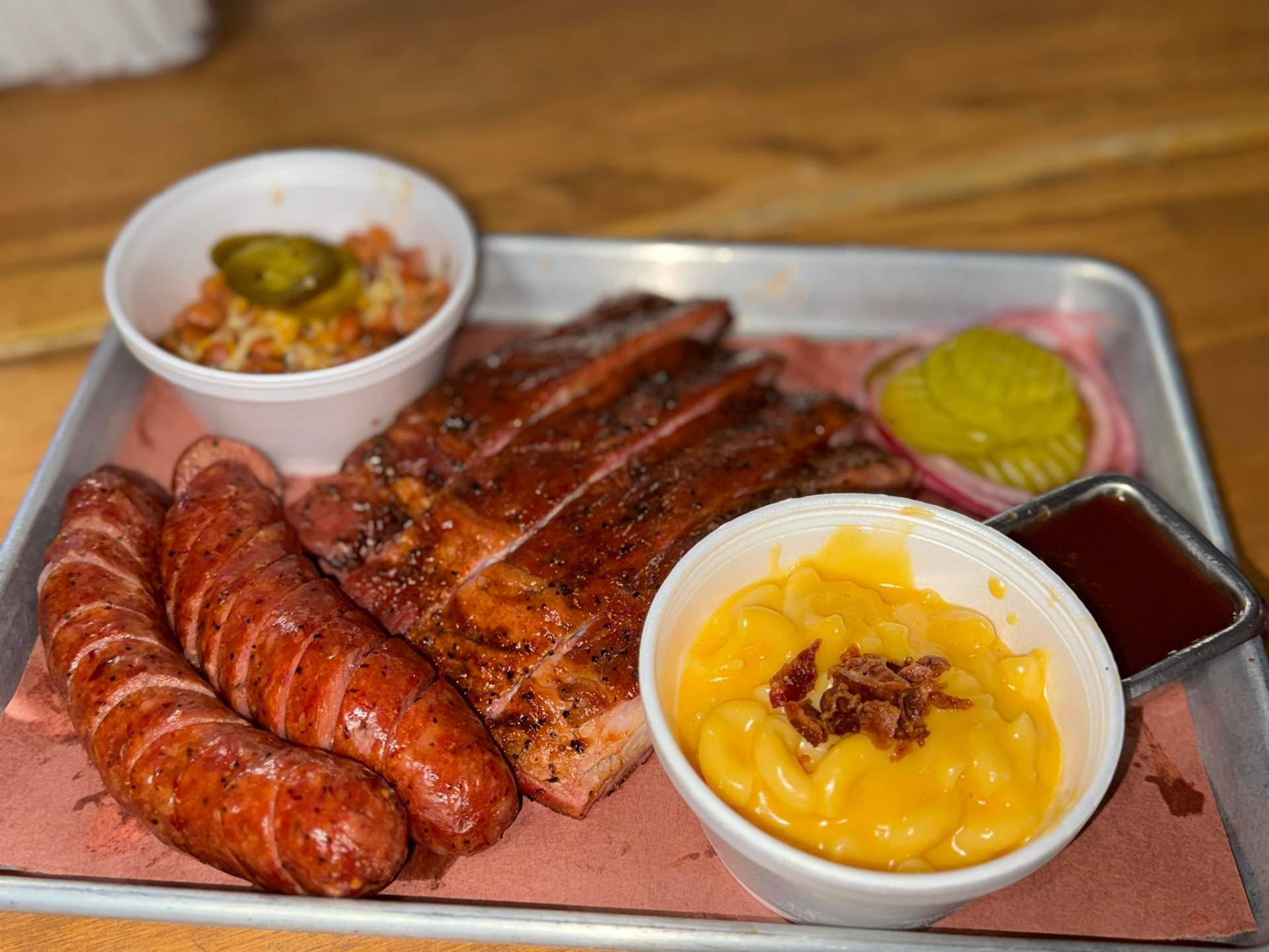 Ribs, sausage links, bacon mac & cheese and pinto beans